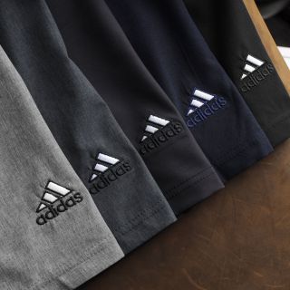 Quần short thun , quần đùi nam chất dù xi giãn dày mịn co giãn 4 chiều thoải mái, 3 túi khoá kéo. Logo thêu size từ 55kg - 85kg