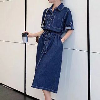 ĐẦM JEAN DENIM EO RÚT TÚI NẮP - DT1655