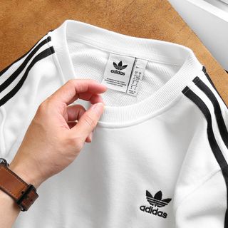áo thun tay dài, áo tay dài nam chất nỉ chân cua dày dặn mịn mát mặc vải đanh không xù lông, logo thêu kết hợp phối sọc rất trẻ trung vs sang trọng Nam Nữ mặc cặp OK size từ 55kg - 85kg
