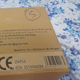 Găng tay cao su y tế size M