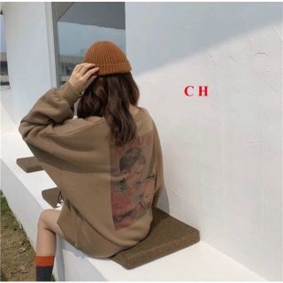 Áo sweater màu nâu in em bé hớt tóc đẹp xuất sắc