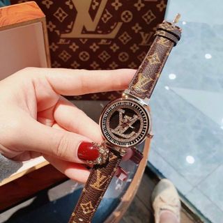 ĐỒNG HỒ L V DÂY DA MẶT XOAY NỮ HOT