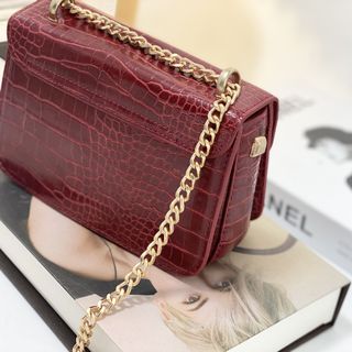 Túi xách CNK vân rắn