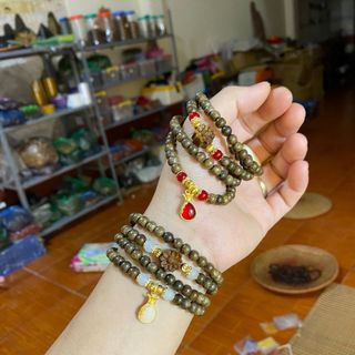 Vòng trầm hương mix chamr hoa sen