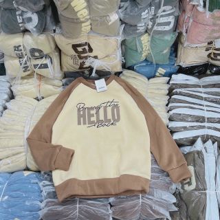 Áo ssweater phối raplang in hello form dưới 65kg