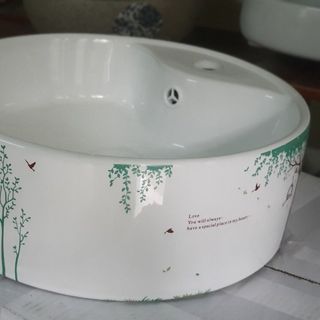 Chậu sứ lavabo để bàn màu trắng họa tiết xin xắn thích hợp phong cách giới trẻ