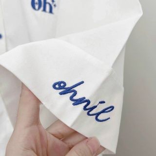 Áo sơ mi kiểu logo thêu gấu chất lụa đẹp