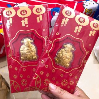Bao lì xì mạ vàng hình ông Thần Tài Tết 2023