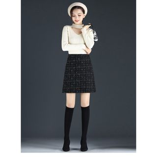 Chân váy ngắn dáng chữ A hot trend Eva design , chất vải dạ tweed màu đen kẻ sọc có quần trong siêu xinh