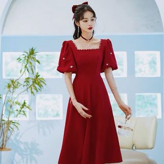 ĐẦM XÒE ĐỎ TAY PHỒNG ĐÍNH HẠT TRAI - DT1704