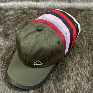 Nón kết hình tam giác viền trắng,đen NK