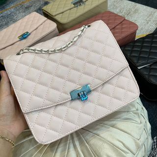 Xỉ túi xách CNK trần trám