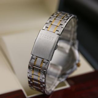 Đồng Hồ Nam Tissot Pin Kim Trôi Dây Đúc