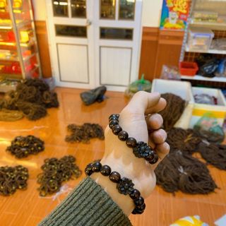 Vòng gỗ trắc mix hoa sen