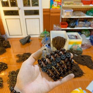 Vòng gỗ trắc mix hoa sen