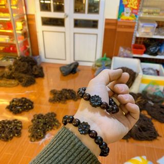 Vòng gỗ trắc mix hoa sen