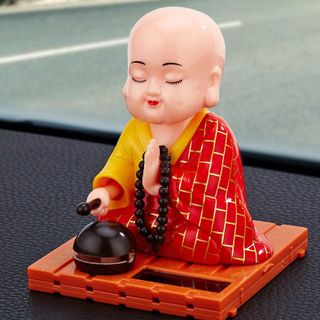 TƯỢNG THẦY CHÙA GÕ MỎ TỤNG KINH