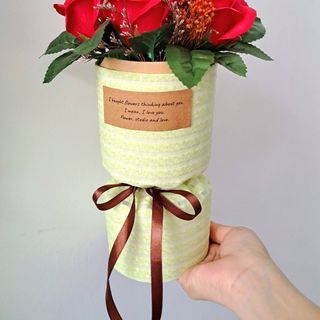 Bó hoa hồng sáp 7 bông bằng vải