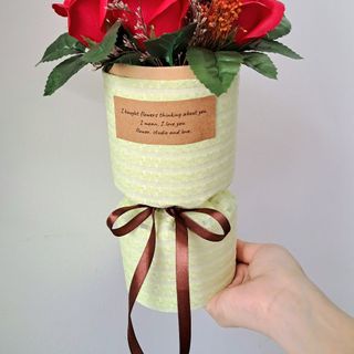 Bó hoa hồng sáp 7 bông bằng vải