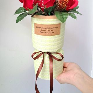 Bó hoa hồng sáp 7 bông bằng vải