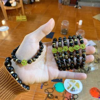 Vòng trầm hương mix chamr cỏ bốn lá giá rẻ