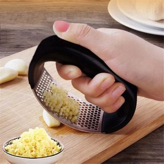 Dụng Cụ Ép Tỏi Cầm Tay Inox