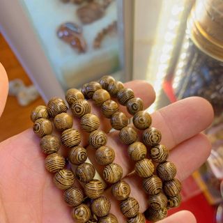 Vòng tay gỗ mun vân giá rẻ