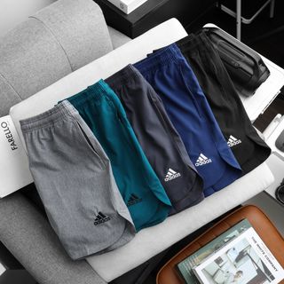 Short Logo xẻ tà, vải xi giãn 4c form trên gối Thể Thao Siêu Đẹp Giá Sỉ,