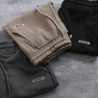 Quần short nam nữ cao cấp logo cao su "DREAM" chất vải tổ ong mặc thoáng mát