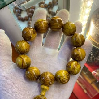 Vòng gỗ vân mắt quỷ