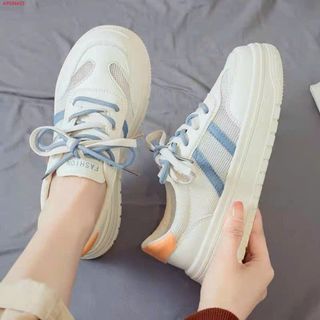 Giày thể thao nữ sọc viền phối lưới