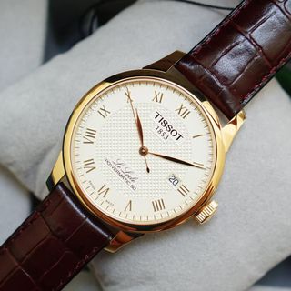 Đồng hồ Tissot nam máy lộ cơ tích cót tự động dây da