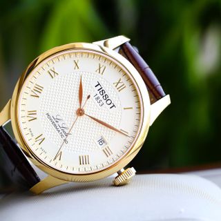 Đồng hồ Tissot nam máy lộ cơ tích cót tự động dây da