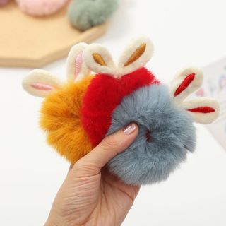 Cột tóc lông xù tại thỏ