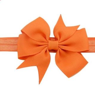 Băng đô nơ cho trẻ em có nhiều màu sắc