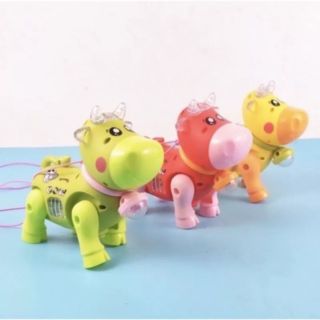 Đồ chơi trẻ em con bò chạy pin phát nhạc và có đèn led lấp lánh
