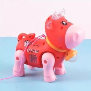 Đồ chơi trẻ em con bò chạy pin phát nhạc và có đèn led lấp lánh