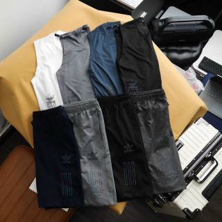 Set tank top das thun poly 2 da trơn láng, co giãn 4c, 3 túi khoá kéo.