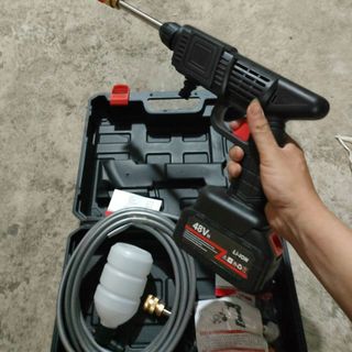 Sỉ máy rửa xe mini dùng pin hộp nhựa
