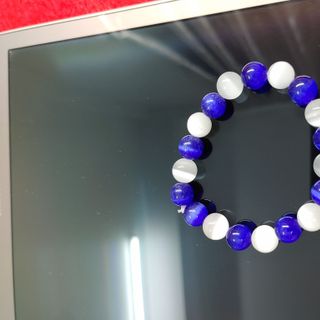 Chuỗi đeo tay phong thủy đá mắt mèo 10ly xanh dương mix trắng đẹp