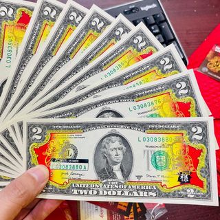 Tiền 2USD Mạ Vàng Thần Tài in Sưu Tầm Lưu Niệm, Làm Quà Tặng, Lì Xì Tết 2023 giá sỉ - giá bán buôn