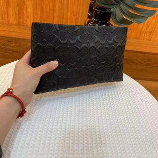 ví cầm tay hoa văn giá sỉ