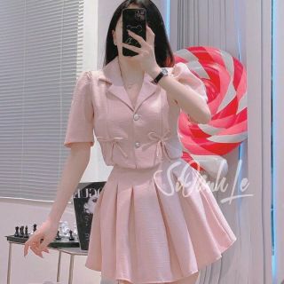 Set áo nơ kèm chân váy xếp ly