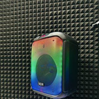 Loa Bluetooh Karaoke NDR 102B - Loa Đèn Led Cực Đẹp 7 Chế Độ, Âm Thanh Mạnh Mẽ, Trầm Ấm, Kết Nối Bluetooth, USB, TF, AUX, TWS, Đi Kèm Chân Loa Có Led RGB Và Micro Không Dây Đa Năng