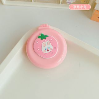 Gương kèm lược gỡ rối
