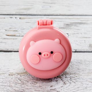 Gương kèm lược gỡ rối