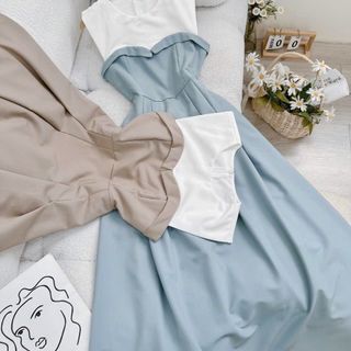 Váy xếp li phối trắng