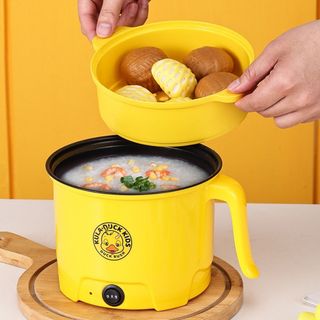 Nồi lẩu có xửng hấp con vịt vàng