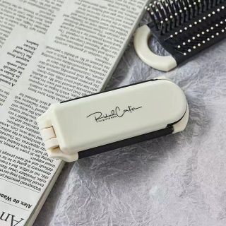 Gương kèm lược gấp gọn