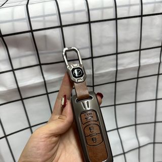Ốp khoá kim loại cho xe ô tô khung viền kim
Loại bao da bò thật sỉ